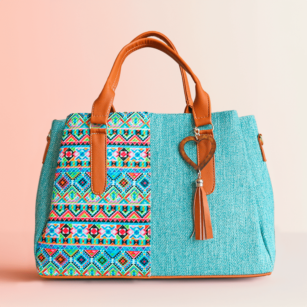 bolsa de mano artesanal color turquesa